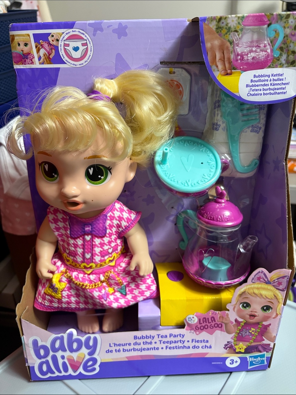 Hasbro Baby Alive Doll with Pink Dress, Purple Trim & Teal Tea Set